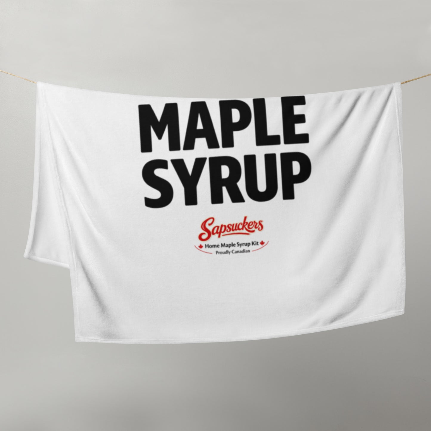 I Heart Maple Syrup Throw Blanket — folded view — Sapsuckers® Canadian throw blanket