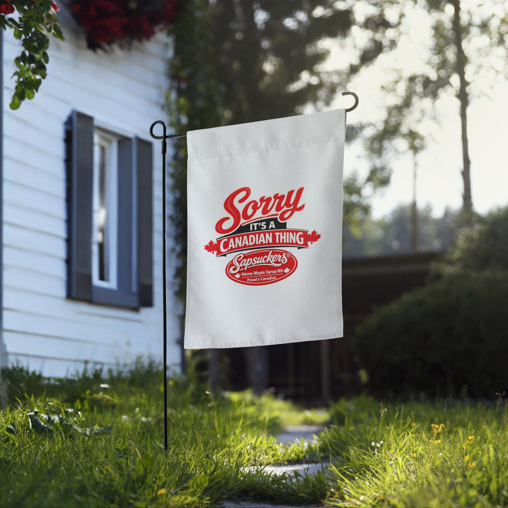 Sorry, It's a Canadian Thing Garden Flag — front view — Sapsuckers® Canadian garden flag